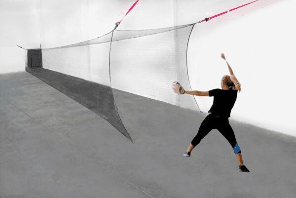 A person is throwing a ball in the air