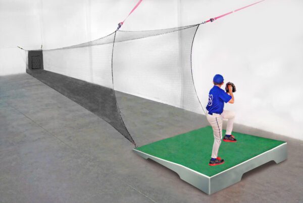 A baseball player is swinging at the ball.