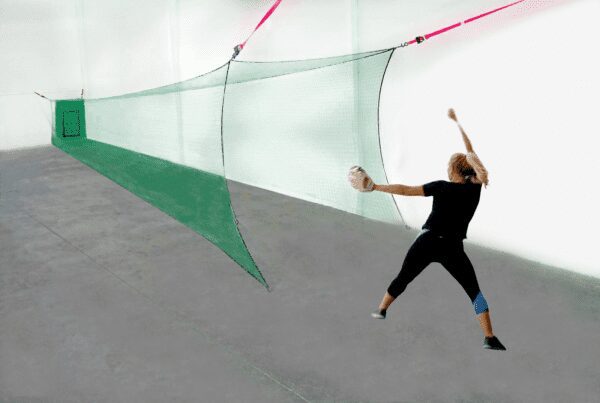 A person is throwing a ball in the air