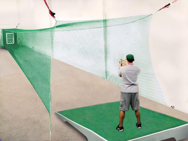 A man taking a picture of the net.