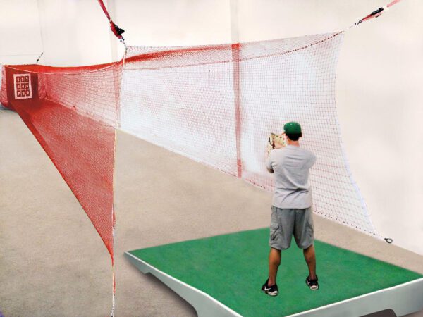 A man is taking a picture of the net.