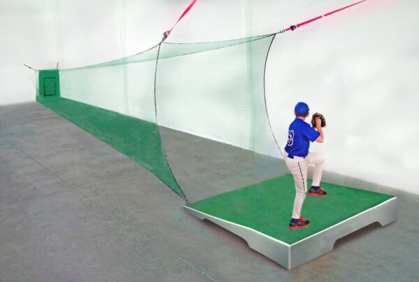 A man and woman are batting in the batting cage.